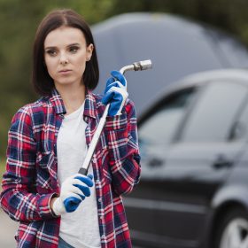 front-view-woman-with-car-background